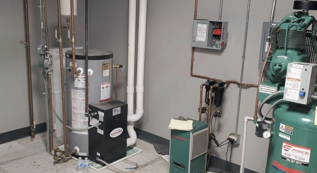 Picking Industrial Air Dryers for Compressor Systems 3 A compressed air system with piping in an industrial workshop