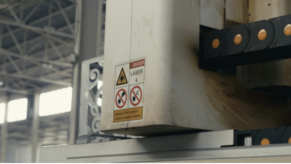 How Innovative Safety Connectors Are Reshaping Global Equipment Design 2 A safety message printed on industrial equipment. Photo Credit: Cemrecan Yurtman on Unsplash